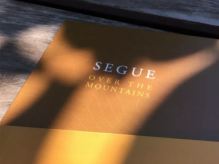 Segue — Over the Mountains (SSCD20), sleeve in sunlight